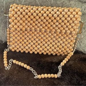 Wooden bead clutch with chain and bead adjustable strap